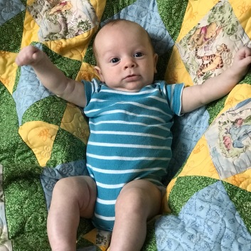 Grandbaby #12 and his quilt