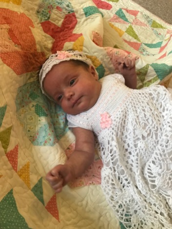 Grandbaby #16 in her blessing outfit